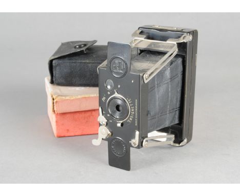 A Houghton Ensign Ensignette No 1 Roll Film Camera, 1½"x 2¼" 1912-1915 version, f/11 lens, shutter working, condition G, some