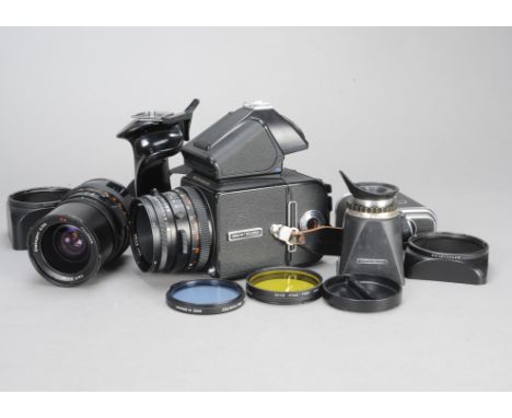 A Hasselblad 500C/M Camera Outfit, serial no RU1411608, shutter working, body G, some scratches to base, wear to edging, some