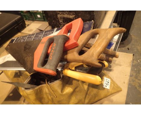 Leather tool bag filled with assortment of tools and fixings to include saws etc. Not available for in-house P&amp;P, contact