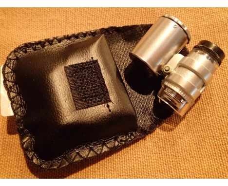 Jewellery detecting 60x loupe with LED light, in leather case. P&amp;P Group 1 (£14+VAT for the first lot and £1+VAT for subs