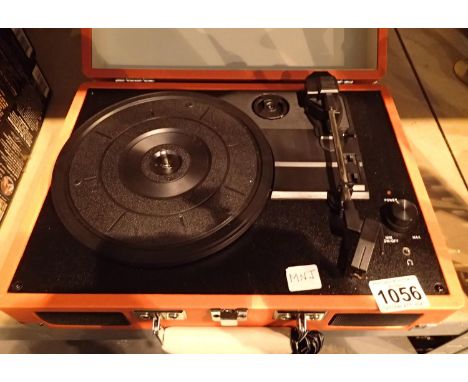 Orange Crosley Cruiser 3 speed record player with power supply. Working at lotting. P&amp;P Group 2 (£18+VAT for the first lo