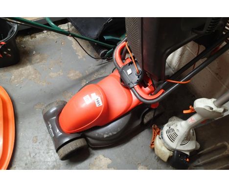 Flymo plug in electric lawnmower with grass box. Not available for in-house P&P, contact Paul O'Hea at Mailboxes on 01925 659