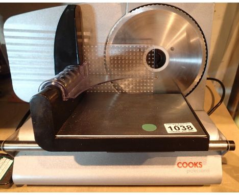 Cooks Professional electric meat slicer. Not available for in-house P&P, contact Paul O'Hea at Mailboxes on 01925 659133Condi