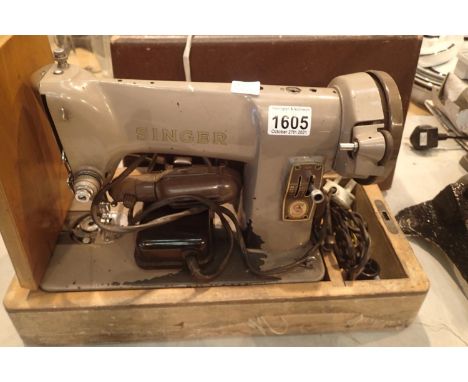 Singer cased 185k sewing machine with leads and controller. Not available for in-house P&P, contact Paul O'Hea at Mailboxes o