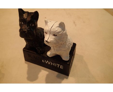 Cast iron Black and White whisky dogs ornament, H: 16 cm. P&amp;P Group 2 (£18+VAT for the first lot and £3+VAT for subsequen