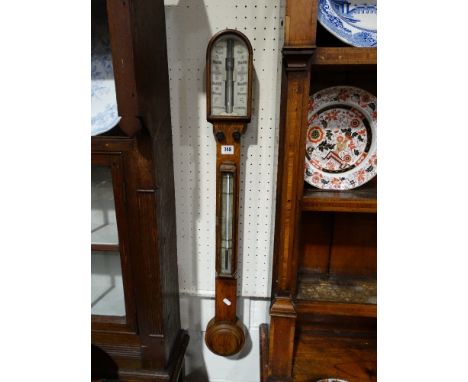 A Carpenter & Westley Of London Oak Framed Stick Barometer