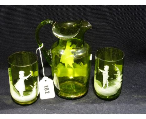 A Green Glass Water Jug &amp; Two Matching Beakers With Mary Gregory Design White Enamel Figures