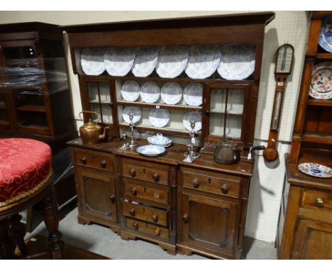 An Antique Oak & Mahogany Anglesey Dresser, Having A Three Shelf Rack With Side Cupboards, The Base Having Side Cupboards Wit