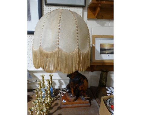 An Early 20th Century Carved Wooden Bull Elephant Table Lamp With Original Tassle Shade