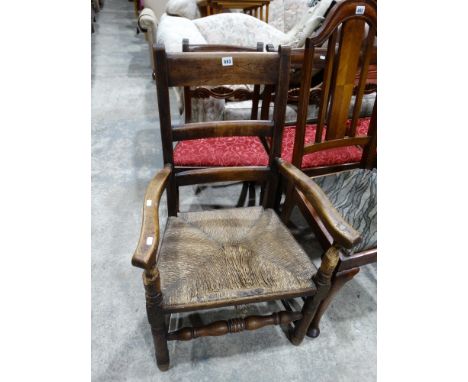 A Rush Seated Ladder Backed Country Carver Chair