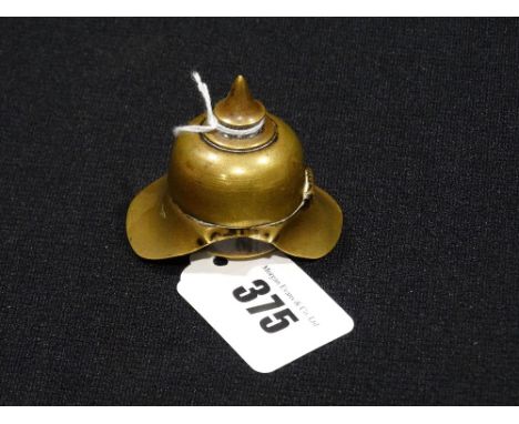 A Brass Inkwell In The Form Of A Picklehaube Helmet