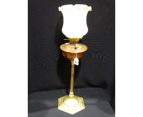 An Hexagonal Based W.A.S. Benson Brass &amp; Copper Oil Lamp With Slender Column, 22" High Excluding Shade