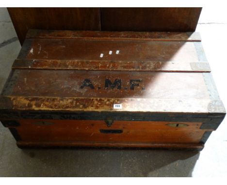 An Iron Bound Travelling Trunk With Double Lock