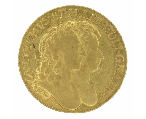 William and Mary, Guinea, 1694/3, Conjoined busts r. R. Crowned shield of arms Lion of Nassau at centre, edge milled, gold, w