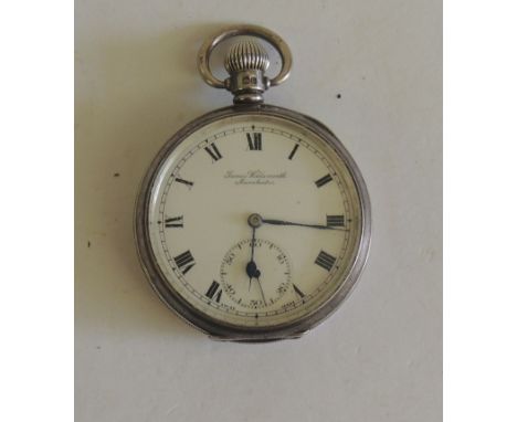 A silver cased, keyless wind gents pocket watch. Hallmarked for Birmingham 1928, the white enamel dial with black Roman numer