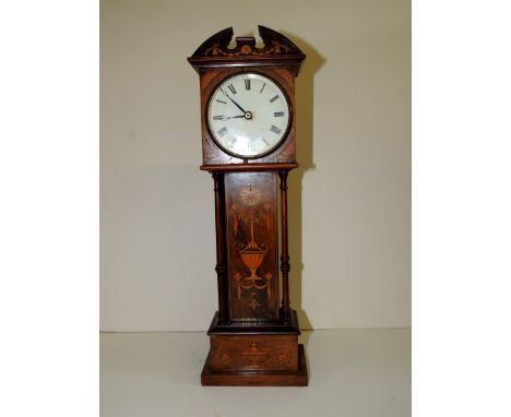 A late Victorian inlaid rosewood miniature longcase clock case having broken arch pediment, fan spandrels to the circular whi