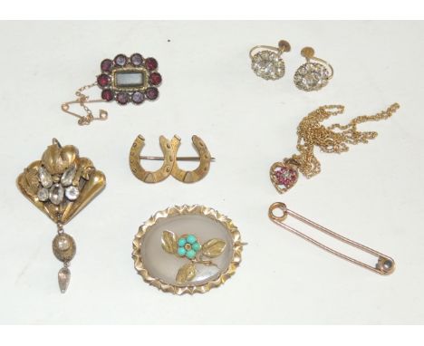 A pair of 9ct gold, paste set screw on earrings, a small 9ct gold heart shape pendant and chain, pendant set with small rubie