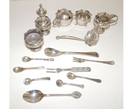 A silver three piece cruet set, hallmarked for Chester 1911, A/F, a silver salt and mustard pot, hallmarked for Birmingham 19