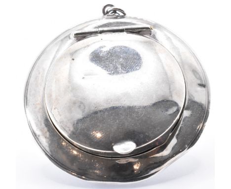 A Samuel M Levi silver hallmarked compact of round form having a hinged lid with mirror within. Hallmarked Birmingham 1923. W