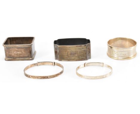 Three 20th Century silver napkin rings to include an engine turned example (hallmarked Birmingham 1957,Henry Griffith &amp; S