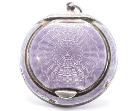 A. Art Deco silver hallmarked silver compact having purple guilloche enamel to the exterior, opening to reveal mirror to the 