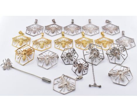 An assortment of yellow and white metal bee jewellery, each of hexagonal form with a bee figure to the centre. Lot to include