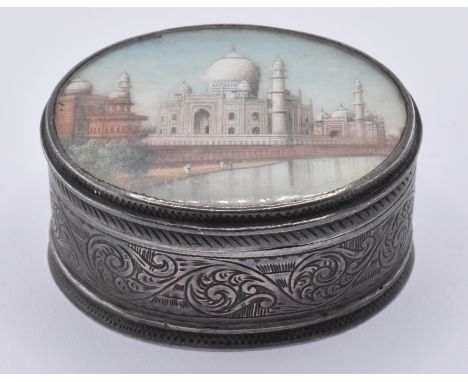 A 19th Century Victorian Anglo Indian silver pill / snuff box of oval form having an oval ivory panel set to the lid. The pan