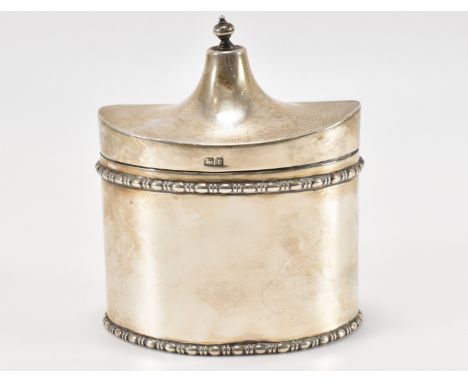 A silver hallmarked tea caddy of oval form having beaded borders with a concave hinged lid. Hallmarked Birmingham 1918. Weigh