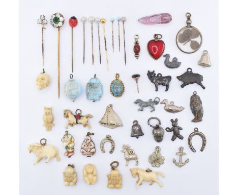 A collection of vintage stick pins and jewellery charms to include a Victorian four leaf clover set pendant (measures 3cm), v