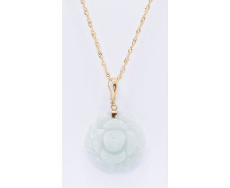 A 9ct gold rope twist fine link necklace chain having a carved green jade pendant. The pendant in the form of a rose and whit