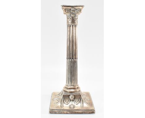 A 19th Century Victorian Hawksworth, Eyre &amp; Co Ltd hallmarked silver candlestick in the form of an Ionic column with flow