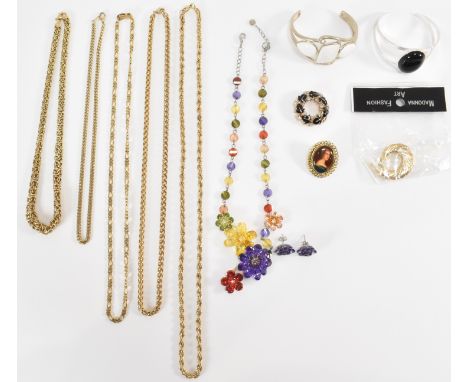 A collection of jewellery to include a Butler and Wilson crystal set floral collar necklace with matching earrings (necklace 