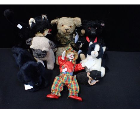 A STEIFF REPLICA 'TITANIC' BEAR a vintage black cat, and other toys