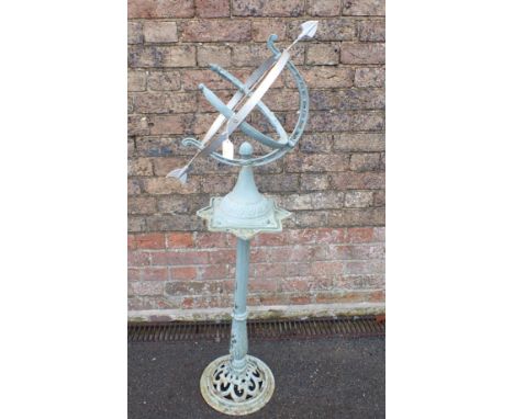 AN ARMILLARY SPHERE SUNDIAL on cast iron stand 121cm high