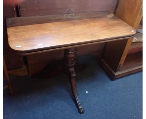 A 19TH CENTURY MAHOGANY TEA TABLE on tripod base with lion paw brass terminals 94cm wide
