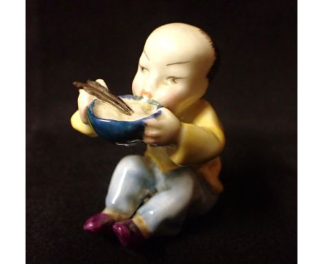 F.E.DOUGHTY FOR ROYAL WORCESTER; 'CHINA' a figure from People of Nations series, a boy with chopsticks 6cm high
