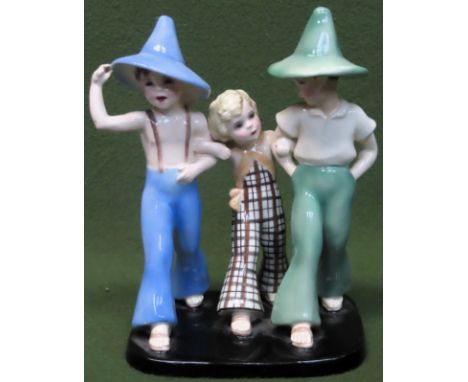 Germaine Bouret for Goldscheider, early 20th century glazed ceramic figure group - Family Strides. Approx. 21.5cms H

used wi
