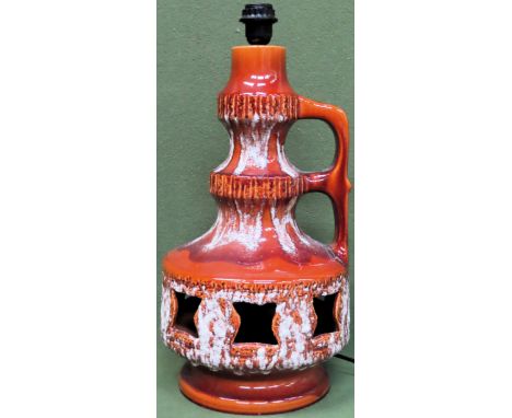 Mid 20th century West German glazed pottery double loop handled table lamp. Approx. 52cms H

appears reasonable used conditio