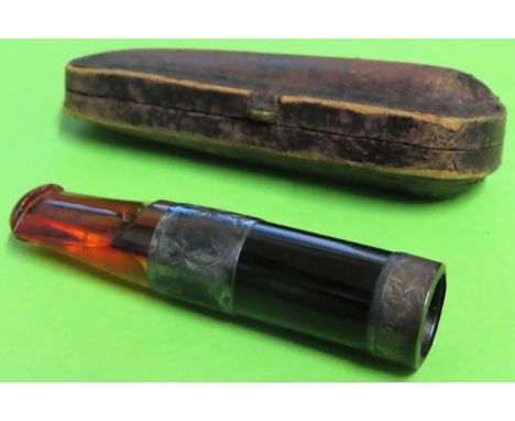 Victorian amber and ebony cheroot holder, with silver coloured mounts, within leather case

reasonable used 