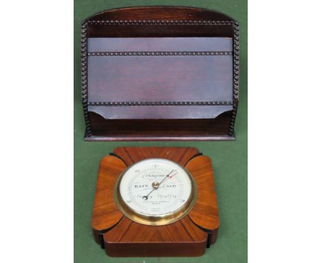 Early 20th century letter rack with hinged cover, plus walnut barometer

Barometer has broken glass 