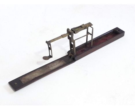 A set of Georgian mahogany sovereign/guinea scales. 