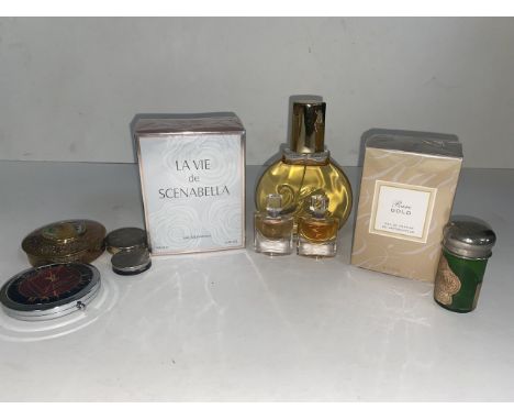 A box of vintage compacts and perfumes 