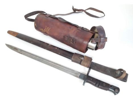 A WWI Remington bayonet and scabbard together with an Otico Flask. 