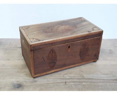 A George III inlaid mahogany tea caddy with ball feet. 