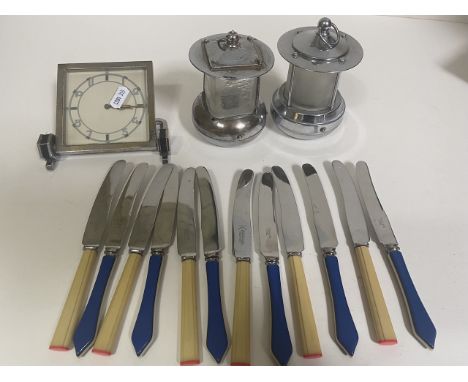 A 1930s vintage Art Deco chrome clock, 2 Pifco lights &amp; 2 sets of bakelite handled knives. 