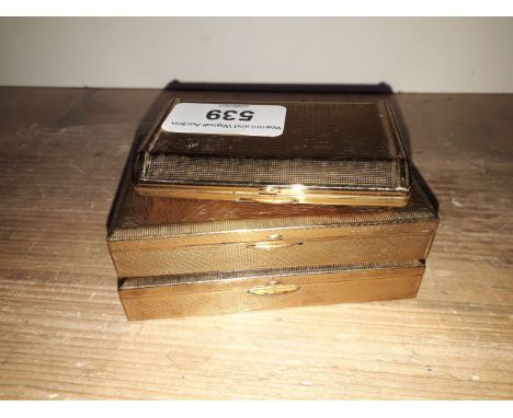 A group of three Melissa musical vintage compacts.