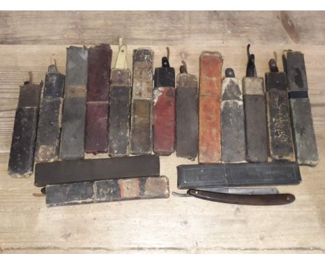 A quantity of vintage cut throat razors. 