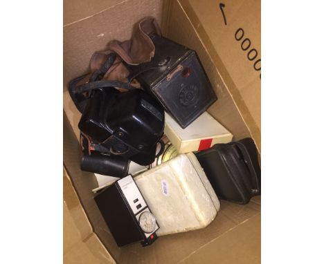 A small quantity of cameras and accessories together with a vintage compact, barometer etc. 