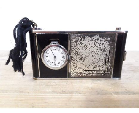 An Art Deco combination compact with cigarette, watch, mirror, powder and lipstick. 