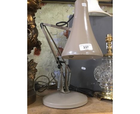 An Anglepoise lamp 